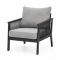 Sillón de exterior con reposabrazos estructura de acero negro cuerda trenzada y cojines grises 80 x 80 x 85 cm